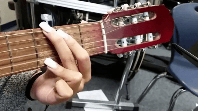 How to Play Guitar with Long Nails Without Sacrificing Your Manicure or Your Music